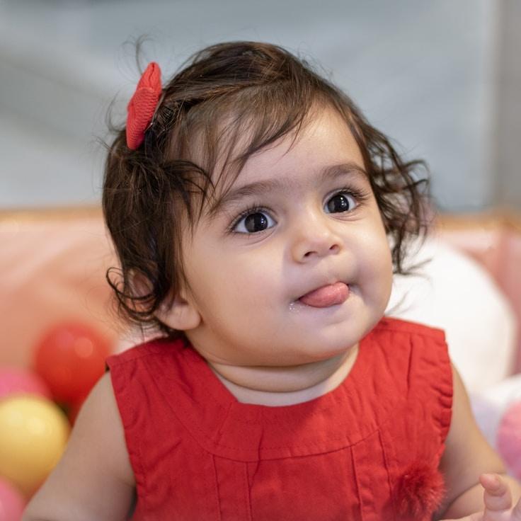 Kaveri Mehta, Lead Design Curator at Pixel Valley Lab, reviewing corporate floral arrangements